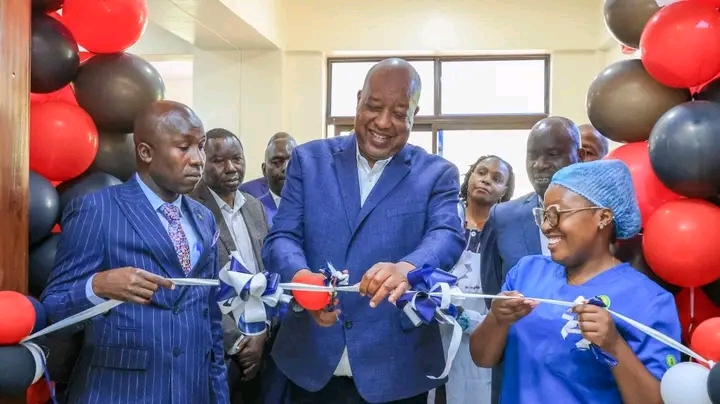HE. Amos Nyaribo Cutting the ribbon signaling the launch of the new dialysis centre at Nyamira County Referral Hospital